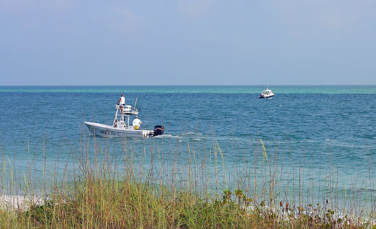 Low-rise beach town and shoreline on Anna Maria Island