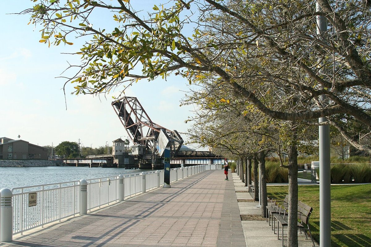 Tampa Riverwalk path along the Hillsborough River at sunset